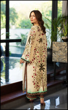 Shirt featuring lush palm tree and floral prints