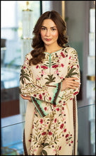 Shirt featuring lush palm tree and floral prints